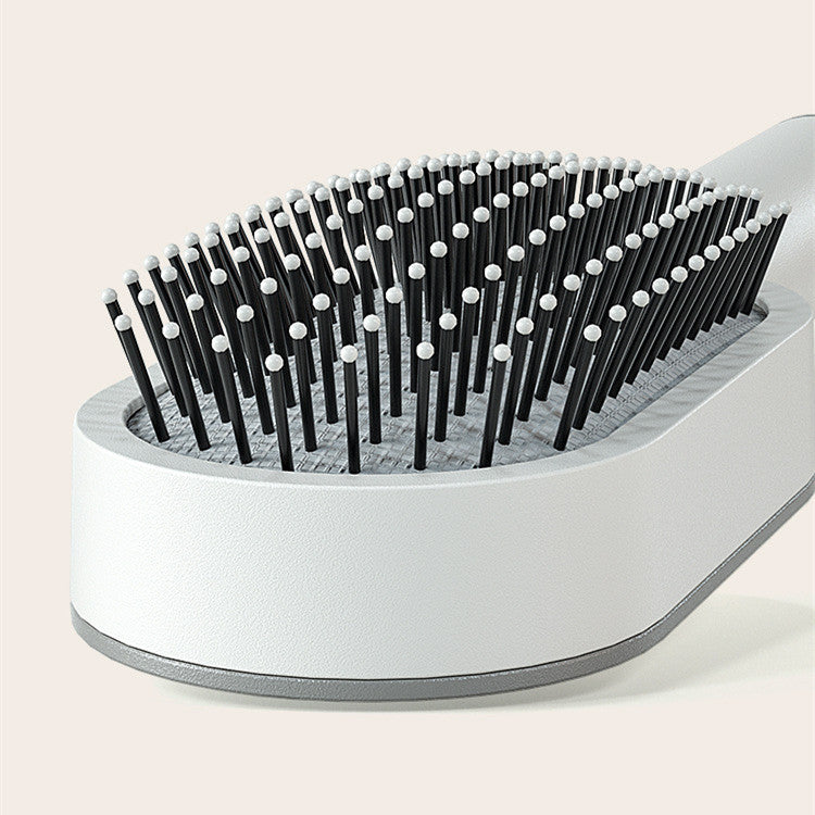 Brosse auto-nettoyante et anti-statique