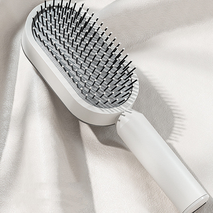Brosse auto-nettoyante et anti-statique